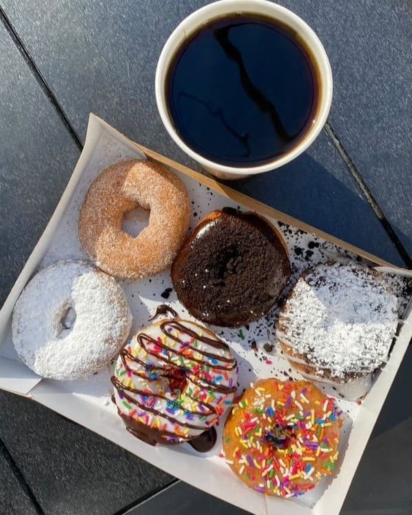 All Freshly glazed donuts with ice cream and dessert options, served with coffee and vegetarian food at Duck Donuts.